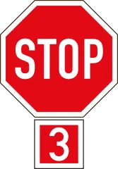 Regulatory 3-way stop sign at a T-intersection