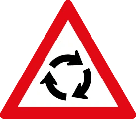 Roundabout ahead sign with circular arrows on a red-bordered triangle.